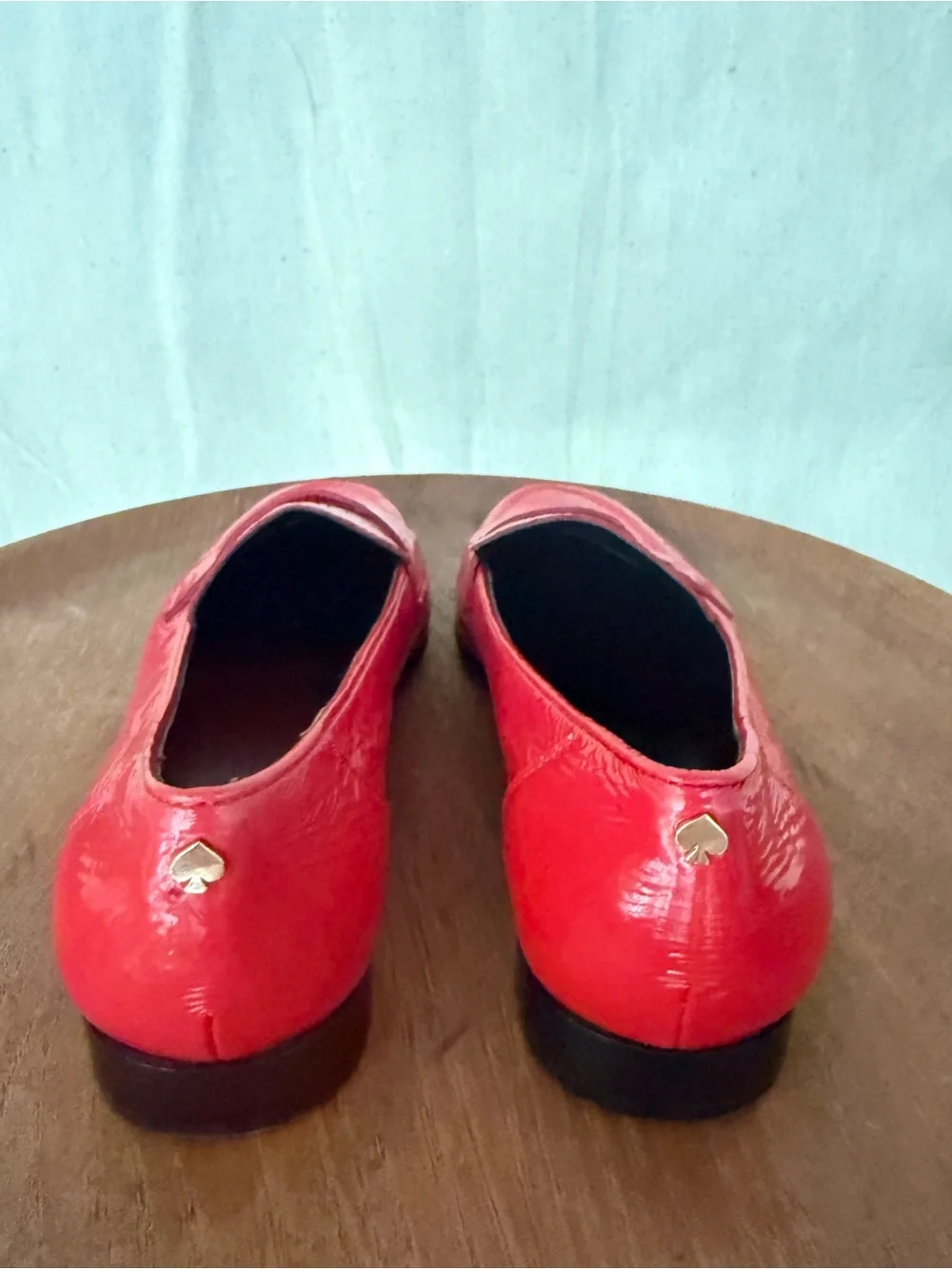 Kate Spade “Genevieve” crinkle parent loafers in Maraschino Red